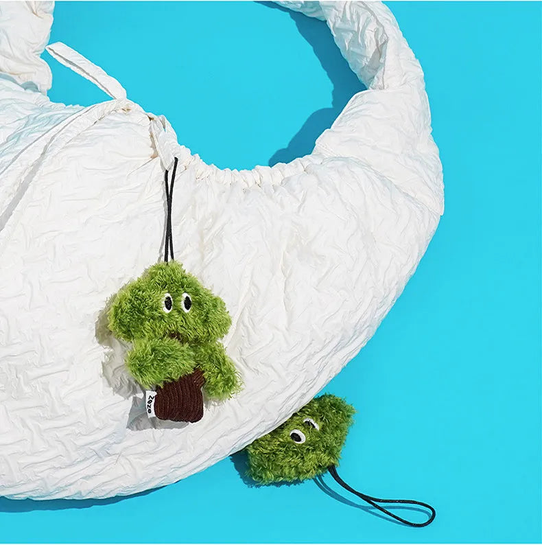 Cat toy with mint bag pendant attached to chewable teasing stick