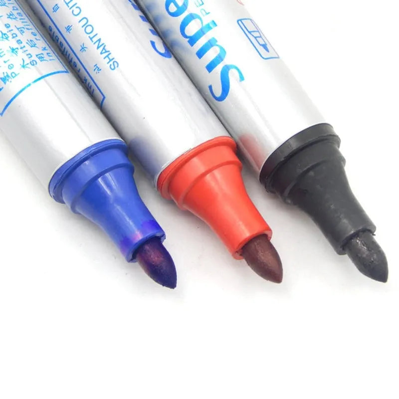 Oil-based markers in black, blue, and red with plastic shell body, 12pcs per box