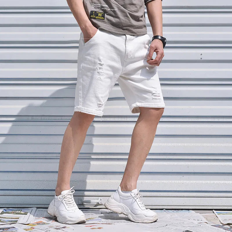 Men's cotton denim shorts in black with loose straight-leg cut and mid-waist zipper closure