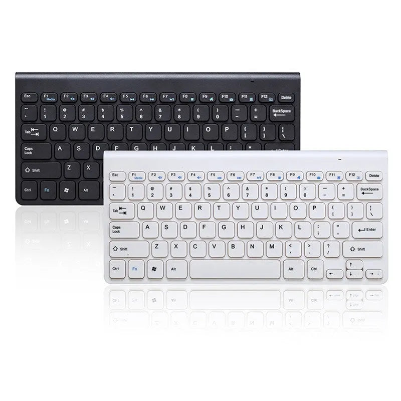 Black and white wireless keyboard and mouse set on a desk.