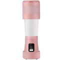 Blue portable USB blender with 450ml cup shown folded and extended next to fruits
