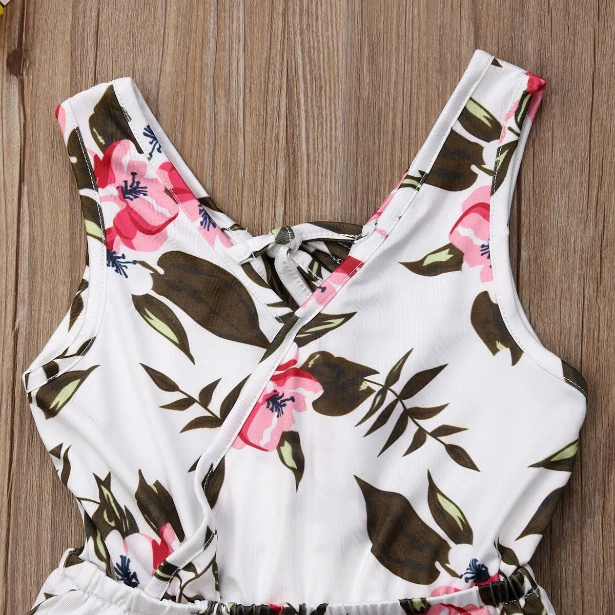 White cotton floral summer outfit for a baby girl with an elasticated waist