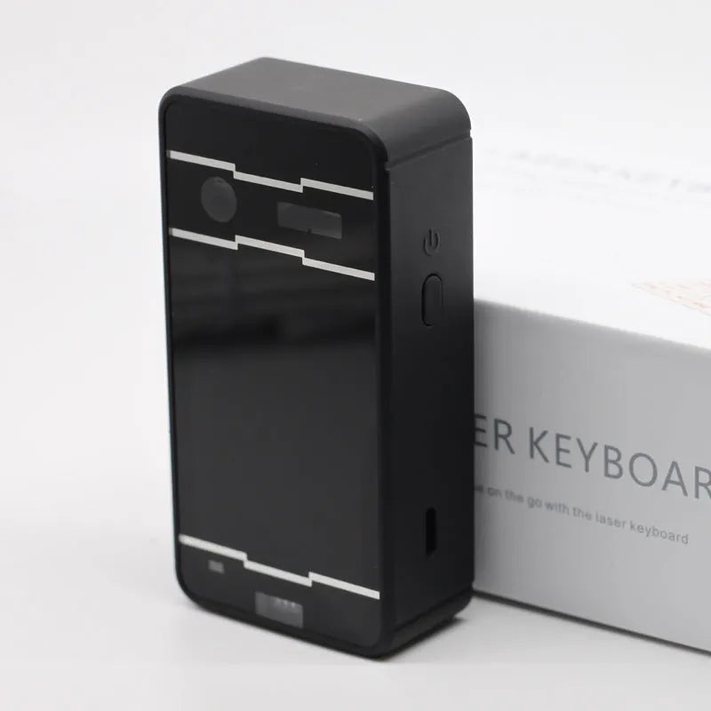 Six socket UK power strip with two USB ports and a long black cable on a wooden desk.