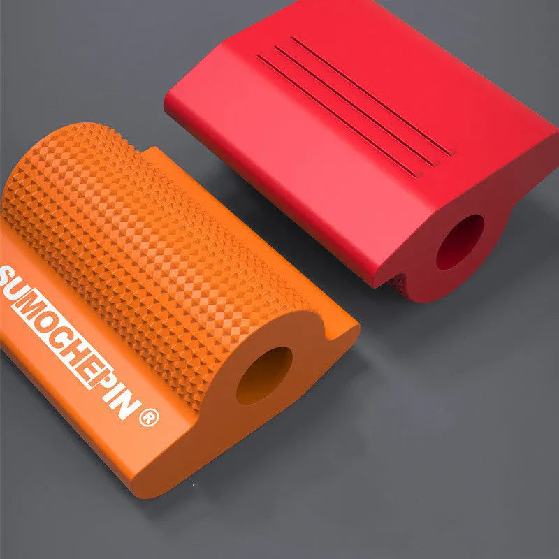 Orange rubber motorcycle gear protection sleeve fitted on a gear lever