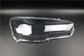 Transparent plastic car headlight housing cover showing clear construction and 50x30x20mm dimensions