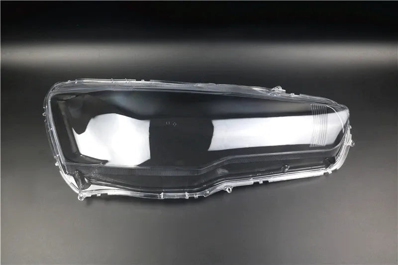 Transparent plastic car headlight housing cover showing clear construction and 50x30x20mm dimensions