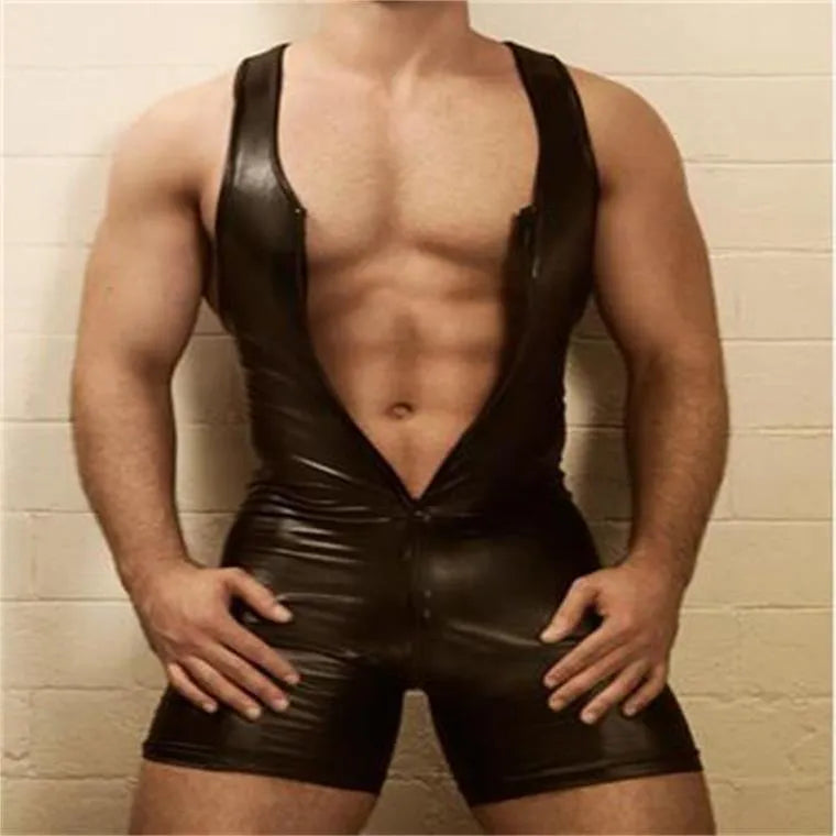 Men's black PU leather fitness tights on a model, showing skinny fit and shiny finish