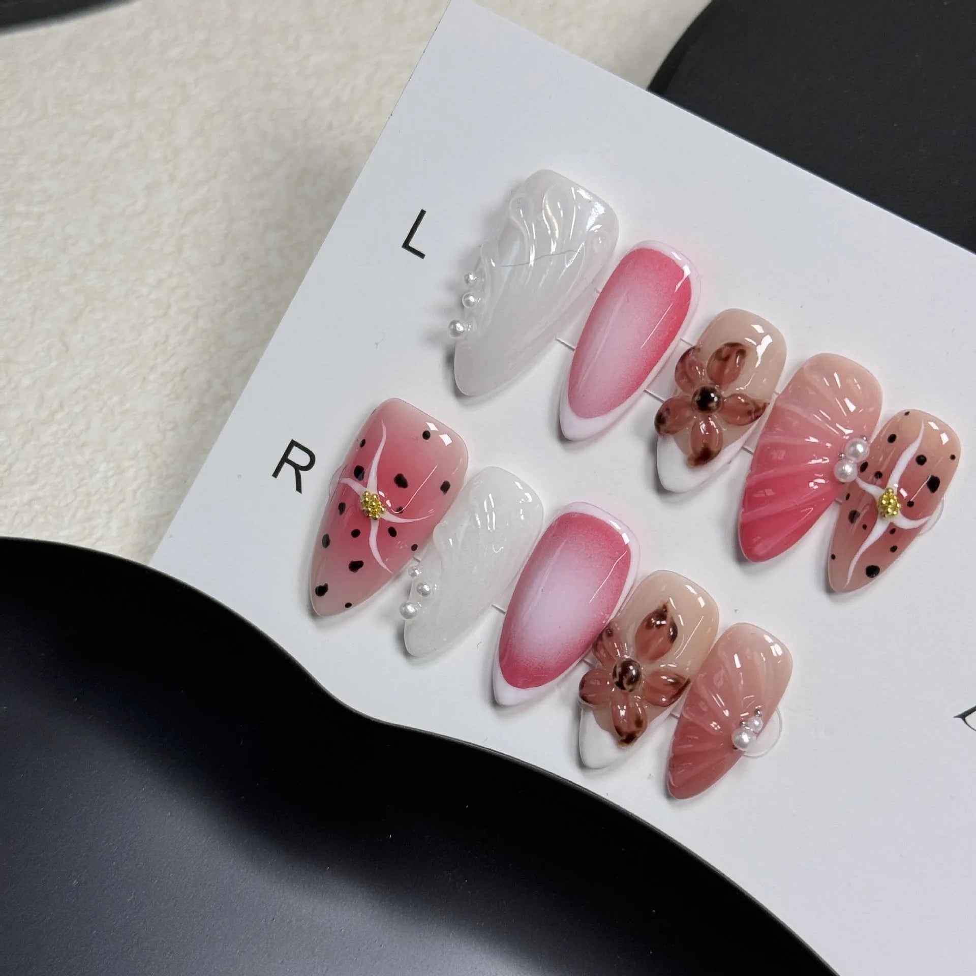 Hand-painted 3D carved nail art patches with embossed candy pattern on an Almond-shaped nail.