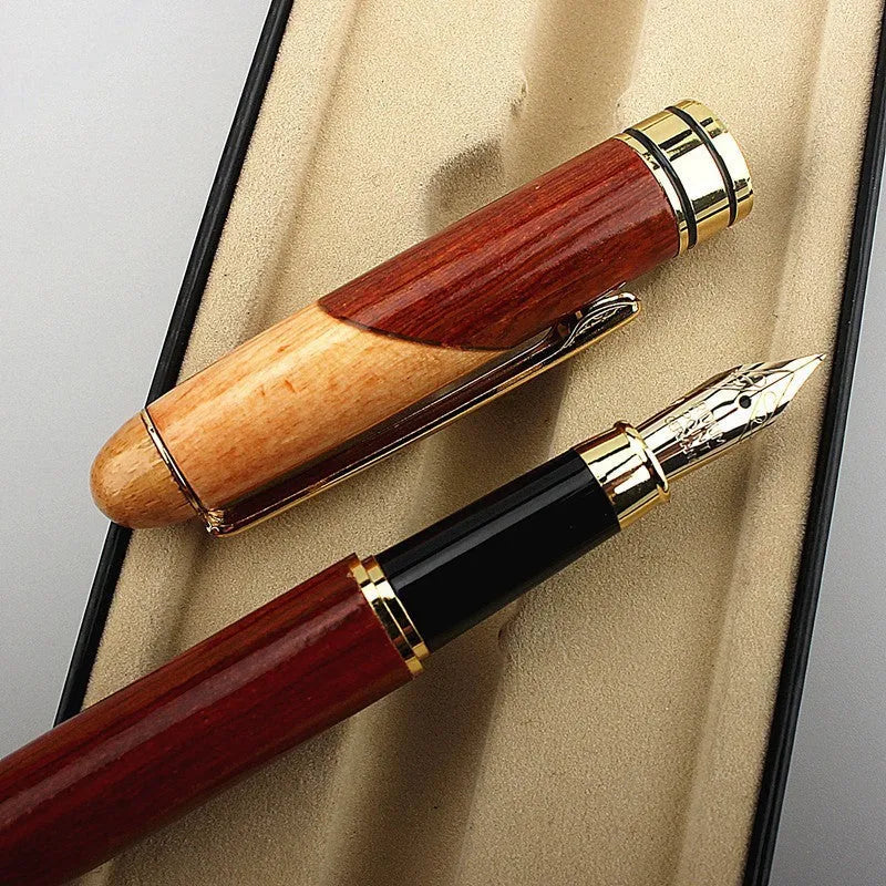 Wooden fountain pen with metal details alongside a matching fabric pen bag
