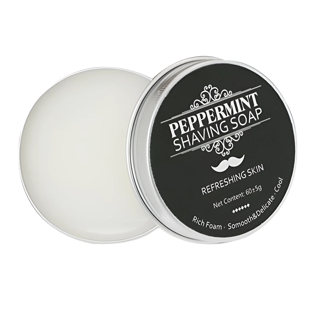 Mint scented shaving soap in aluminium box with rich foam on brush