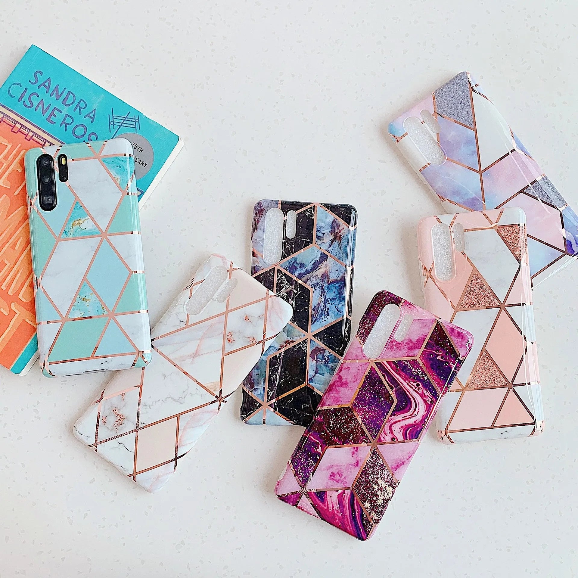 Electroplated marble design TPU mobile phone case for Huawei and Samsung phones in multiple colours.
