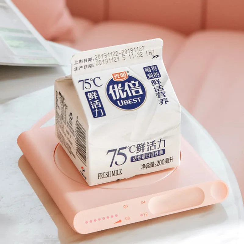 Pink and white USB-powered mechanical heating cup pad with timed warming function