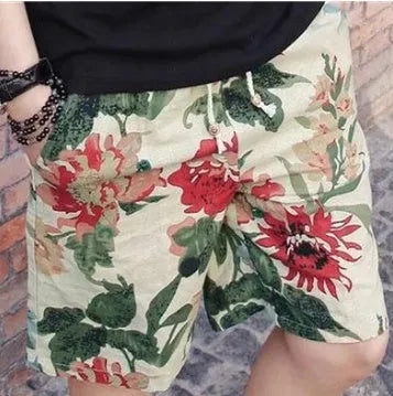 Men's linen beach shorts in print pattern with elastic waist on a neutral background