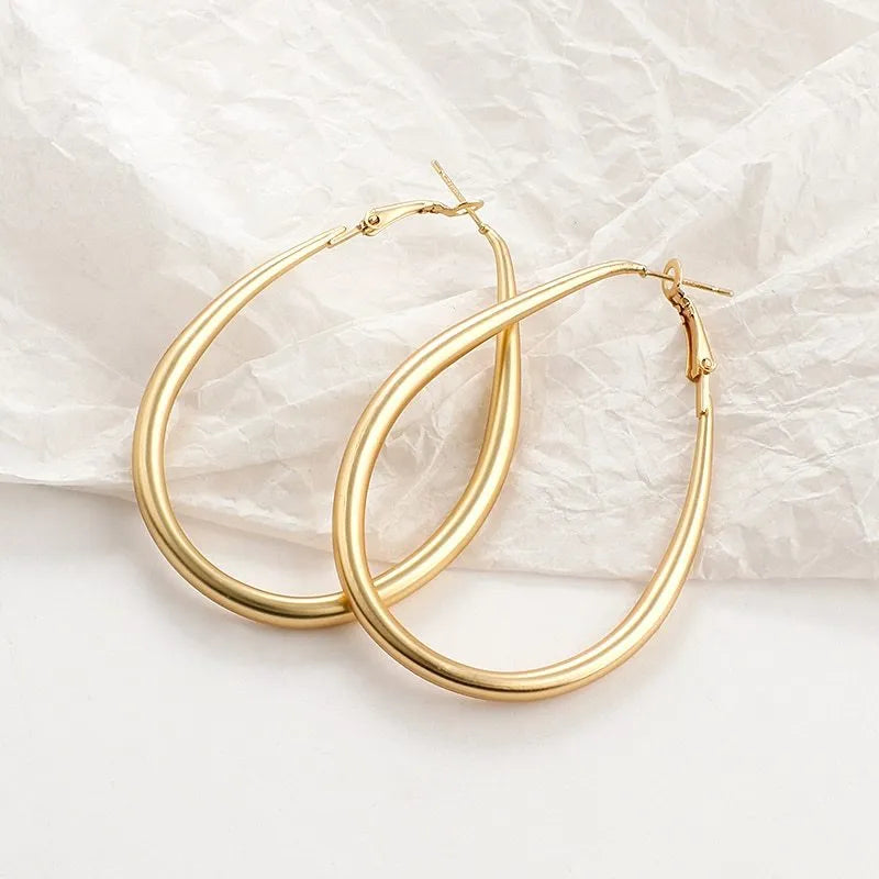 Women's simulated pearl and alloy earrings in gold colour, geometric shape