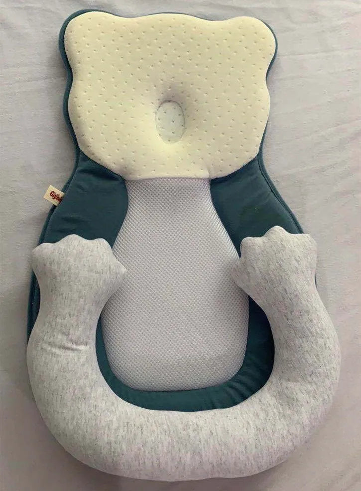 Portable baby flat sleep pillow with soft cotton surface in multiple colour options on a neutral background.