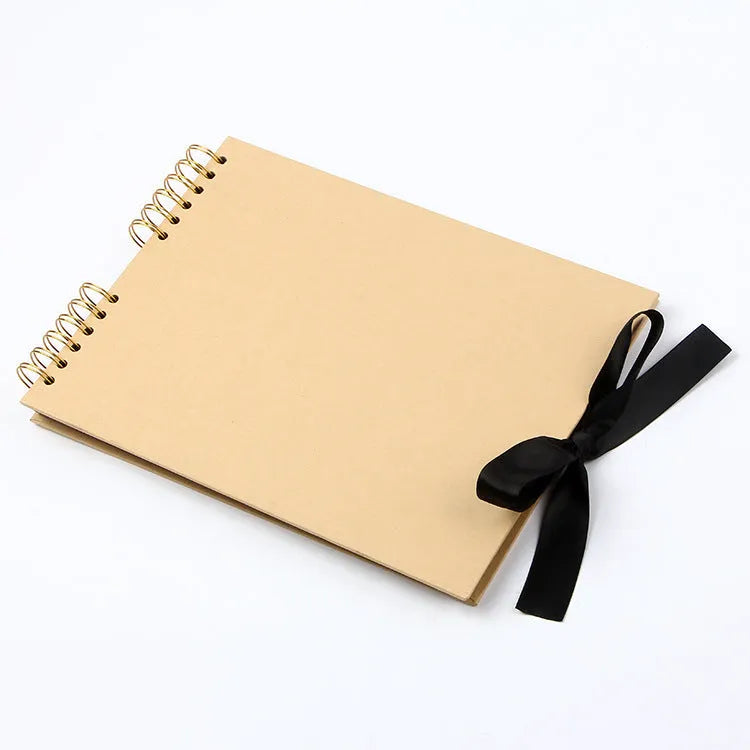 Handmade DIY photo album with black cardboard and Kraft paper cover, showing coil binding and yellow colour option.