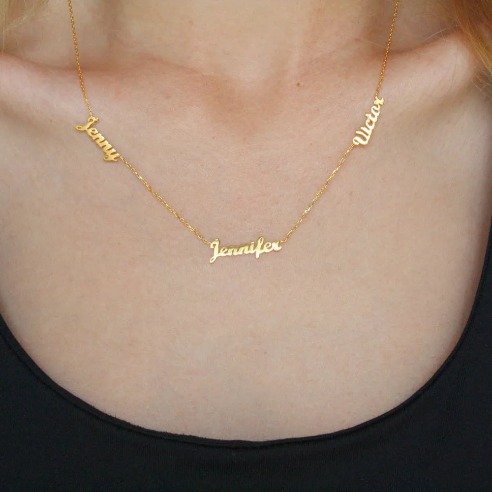 Custom stainless steel name necklace with gold plating, 4x1cm pendant on 40cm O-chain, personalised with three names