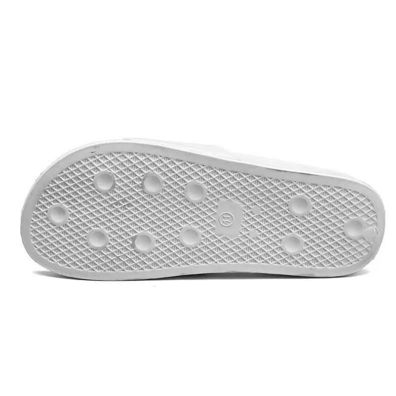 Large black and white open-toe men's slippers with a rubber sole, showing size range 36 to 46.