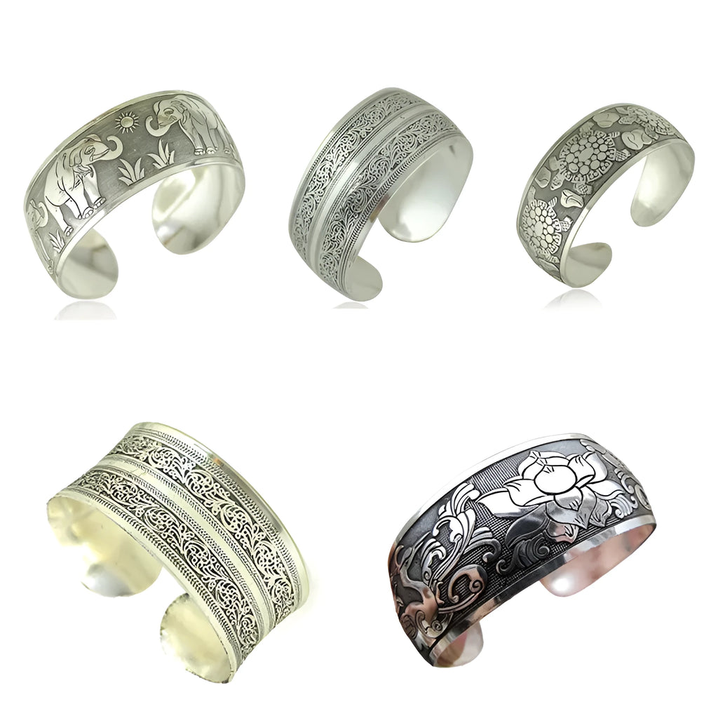 Open cuff bracelet with carved ethnic Miao silver design in alloy material