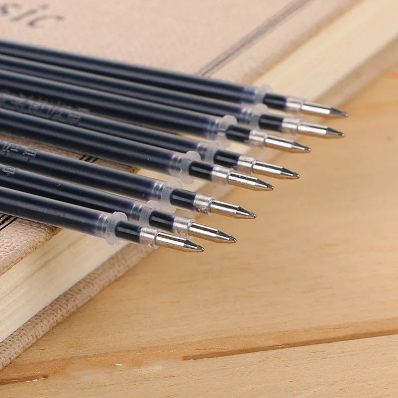 Automatic fade and disappear pen set showing pen holder, case, and eight refills