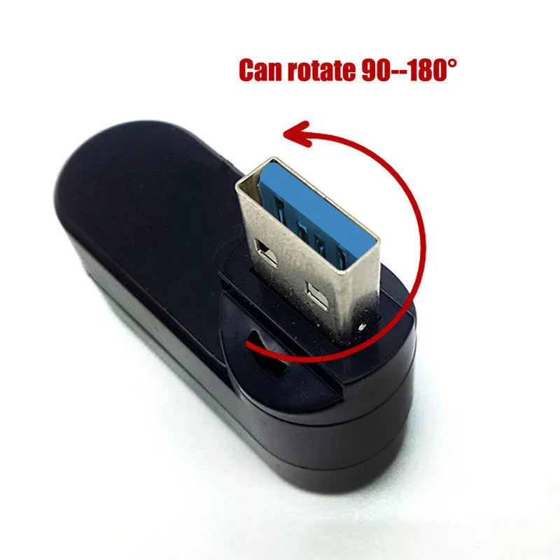 Black or white USB rotary splitter hub with four USB 3.0 ports on a desktop