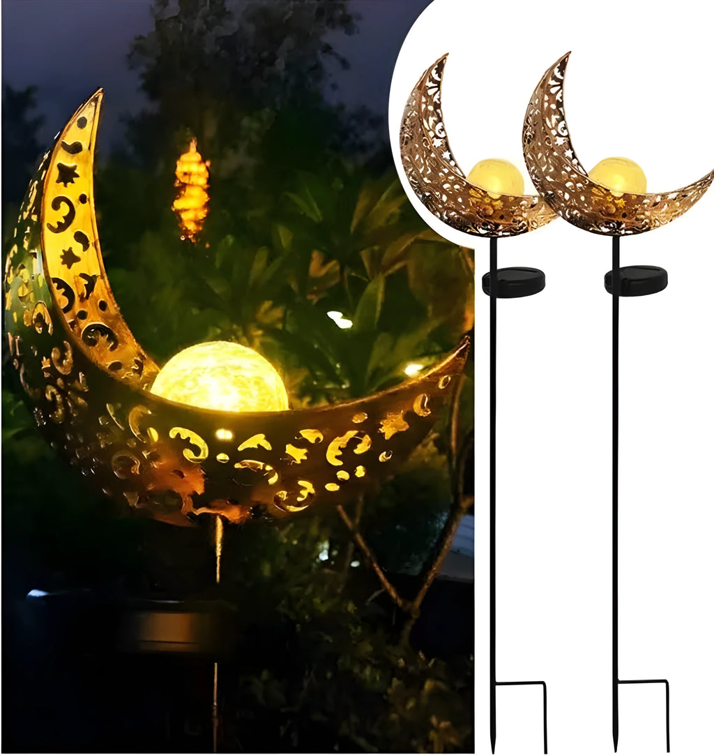 LED solar flame light with warm white glow in a garden, featuring iron and glass construction and stake stand