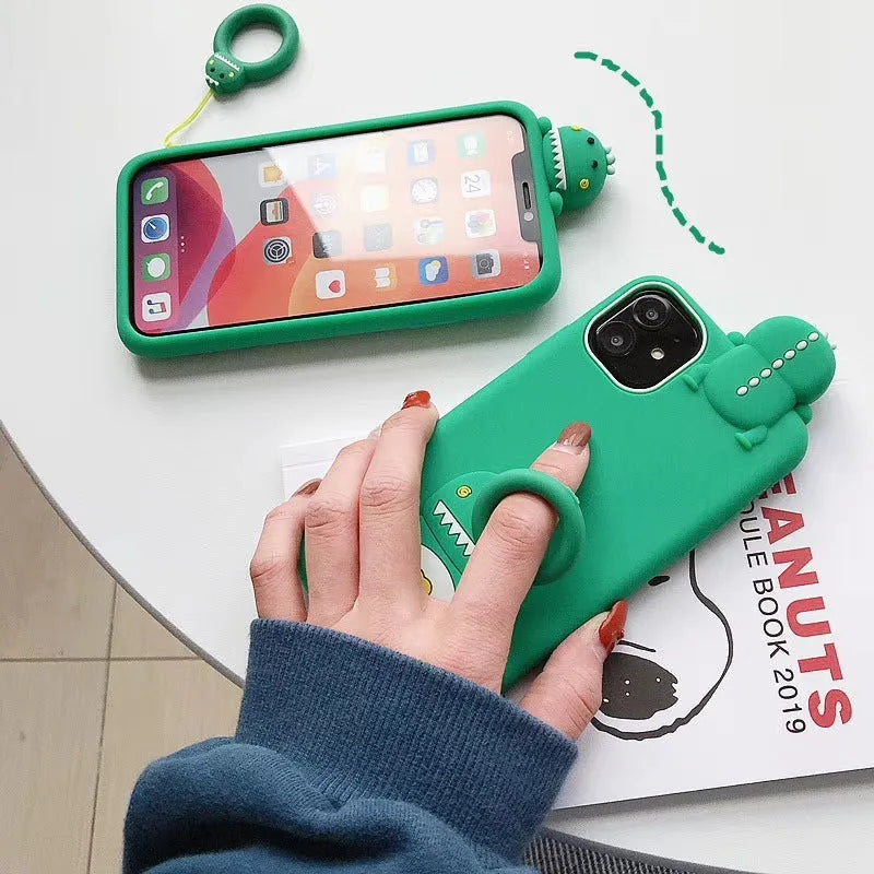 Green silicone iPhone case with cartoon animal design showing back cover style for drop protection