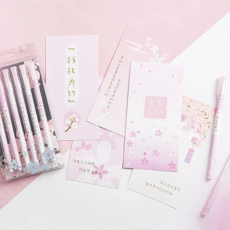 Sakura gel pen set with six black ink pens showing pull-out mechanism and 0.5mm needle tube refills