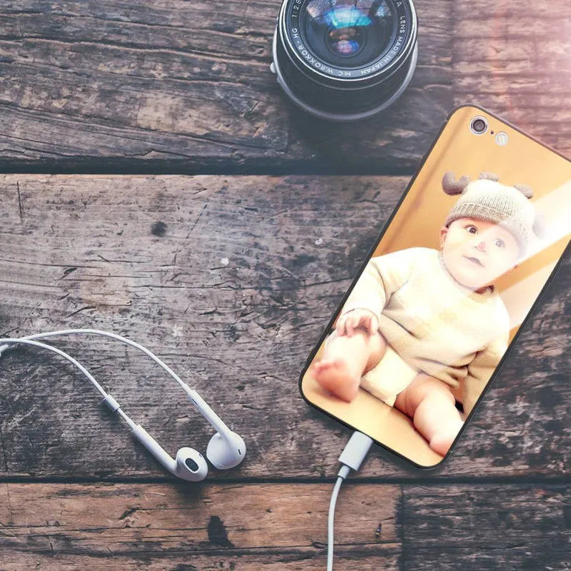 Patterned hard iPhone case with raised edge around camera lens on a table
