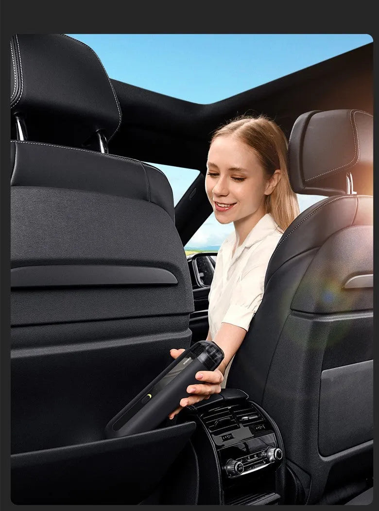 Baseus wireless handheld car vacuum cleaner in black, white, or green with blowing hose attachment.