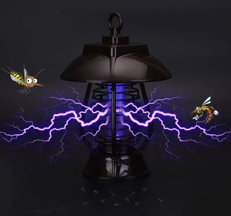 Black solar-powered electronic mosquito lamp with solar panel on top for outdoor garden use.