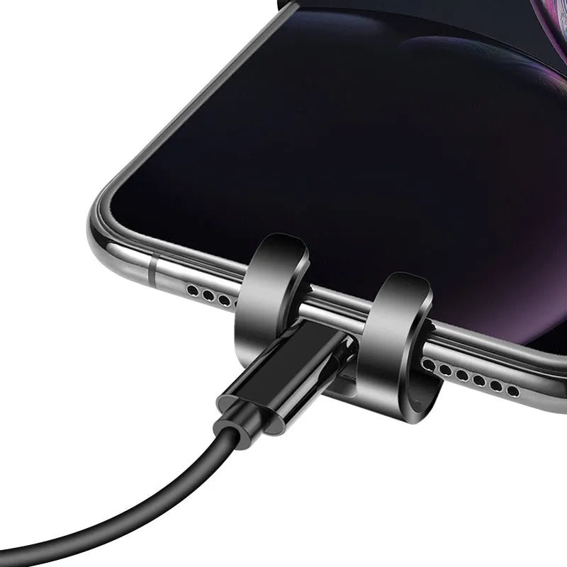 Black S4 ABS mirror finish mobile phone bracket mounted in a car air vent