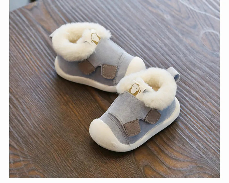 Children's velvet toddler shoes in various colours, showing non-slip sole and soft upper.