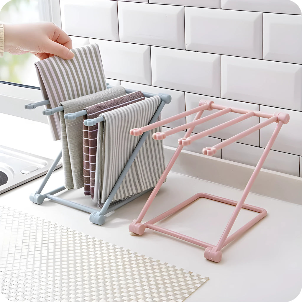 Foldable plastic dishcloth shelf in light blue with bottles stored vertically