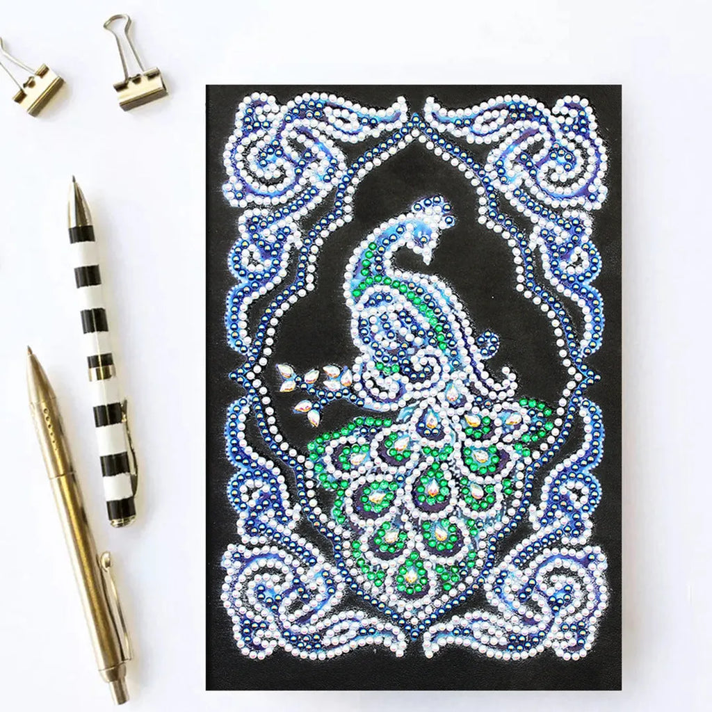 Black A5 diamond painting notebook for creating a peacock-themed journal with shaped drills.
