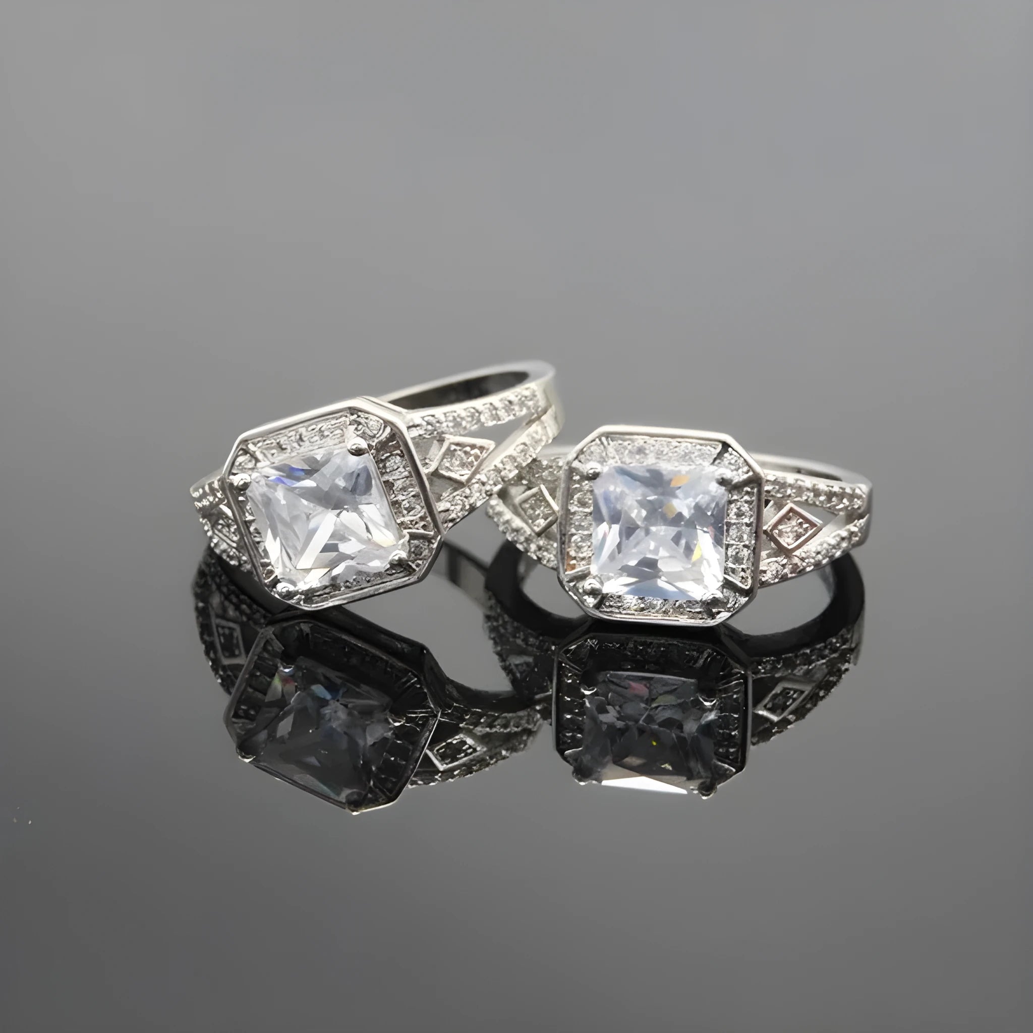 Geometric hollow women's ring with quadrilateral pattern and zircon stones in platinum finish