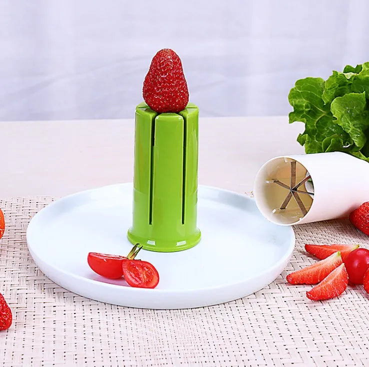 White ABS plastic vegetable and fruit slicer with six stainless steel blades.