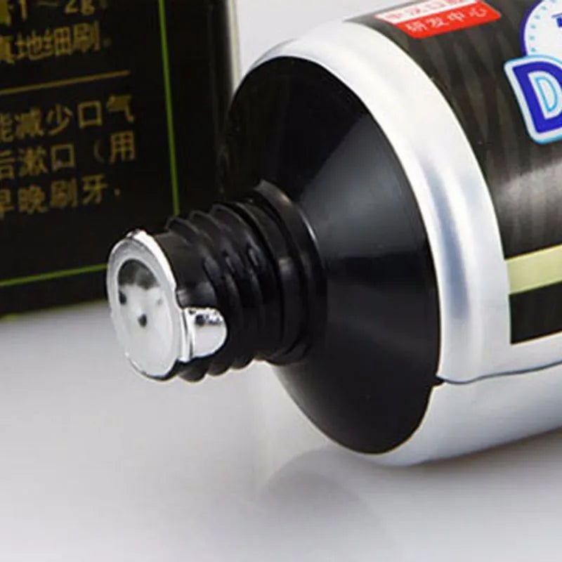 Black bamboo charcoal toothpaste tube for whitening teeth and oral hygiene