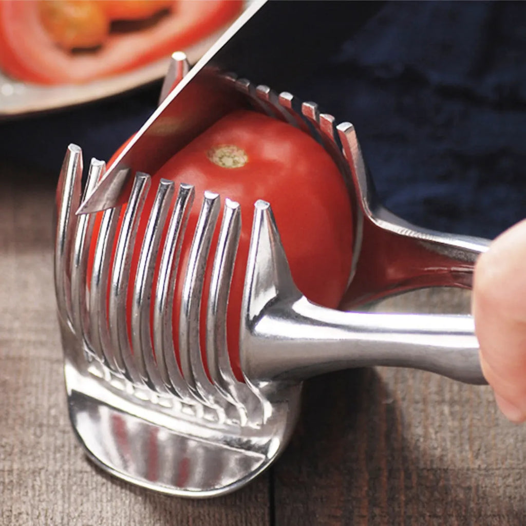 Silver plastic lemon slicer kitchen gadget on a countertop