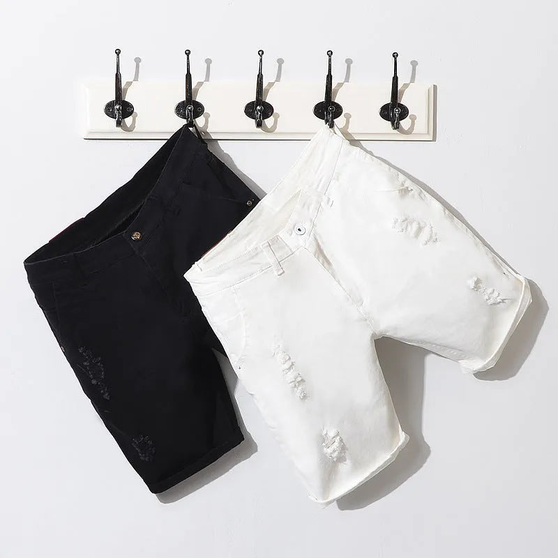 Men's cotton denim shorts in black with loose straight-leg cut and mid-waist zipper closure