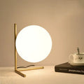 Glass shade LED table or floor lamp in one of three size options for living room or study.