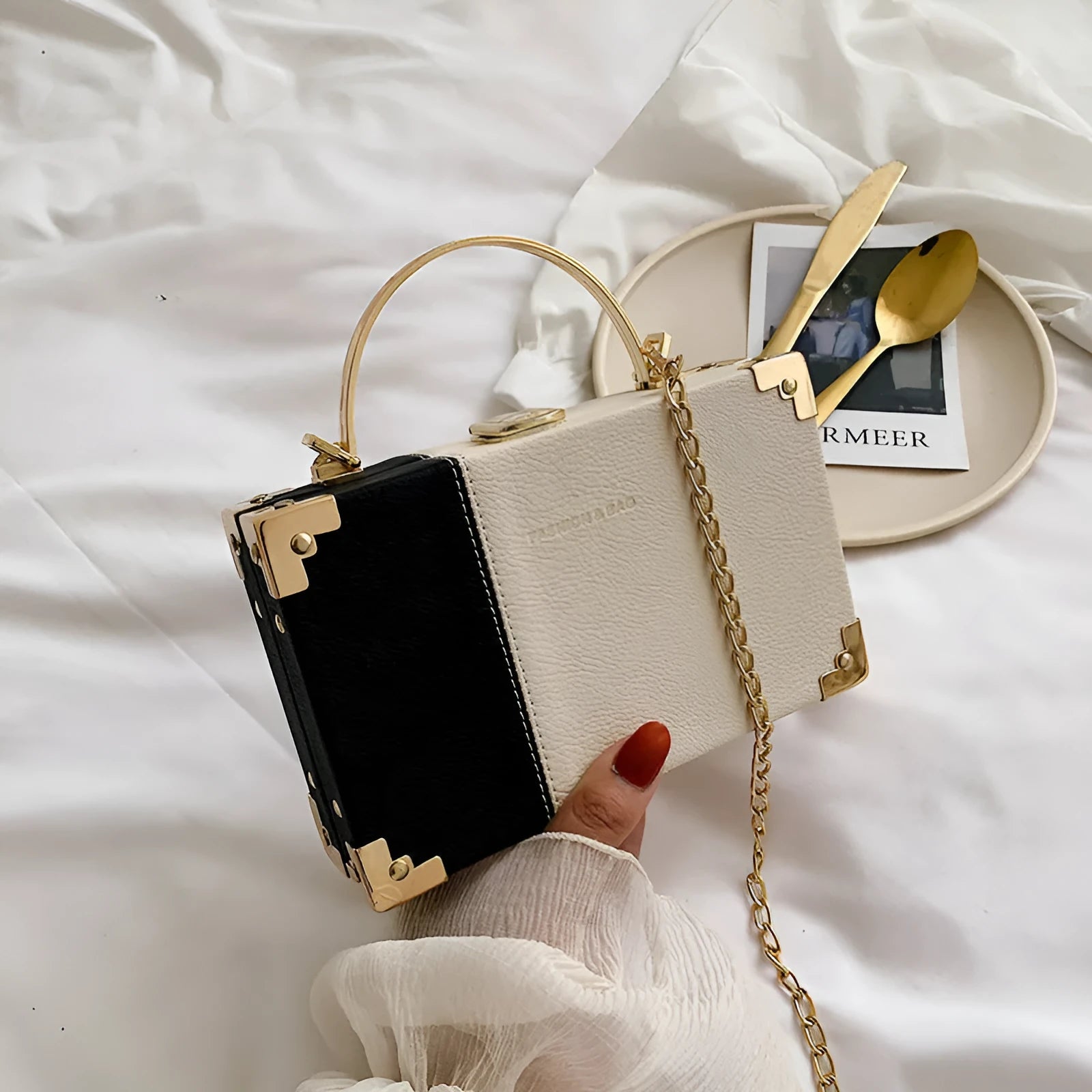 Ladies party clutch bag in orange with box handle and long chain, PU artificial leather, 19x5x12cm