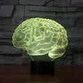 Brain-shaped 3D LED acrylic desk lamp with remote control showing colour-changing illumination