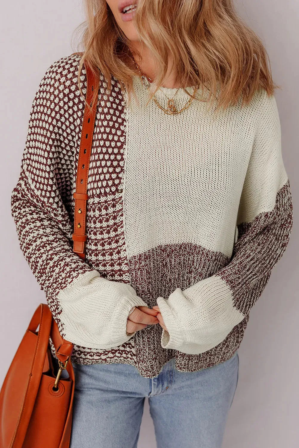 Dark khaki colour block women's loose knit sweater with a back tie and drop shoulders.
