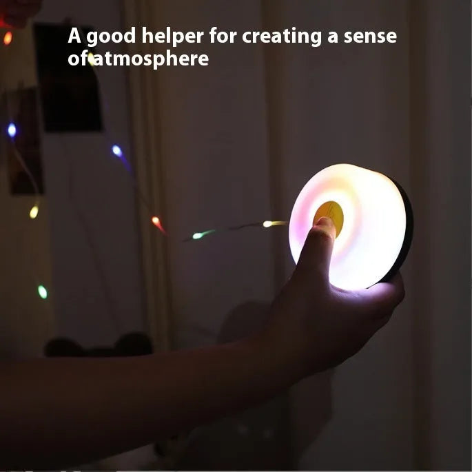 Rechargeable outdoor LED string lights with 30 beads on an 8m cord, showing warm white and colour-changing modes.