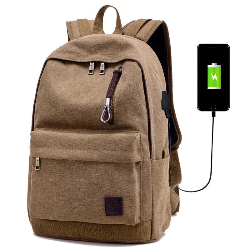 Canvas backpack in grey colour showing external USB port and multiple compartments.