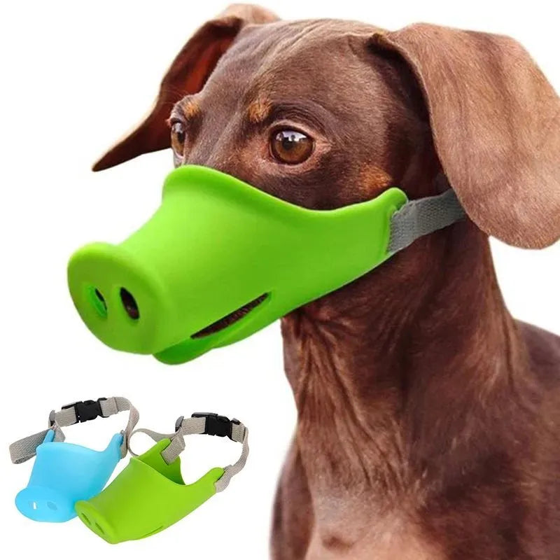 Blue and green silicone dog anti-bite mouth covers shown in large and small sizes.