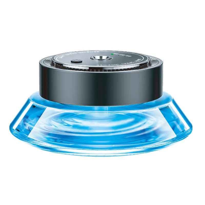 Magnetic car air freshener unit in Gentleman's Black or Qian Shan Cui colour, shown with fragrance fluid.