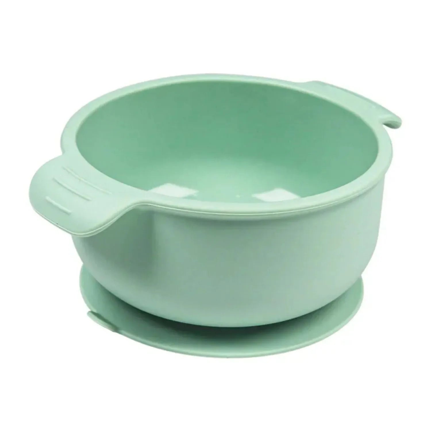 Blue silicone pet bowl with a white suction cup base on a kitchen floor.