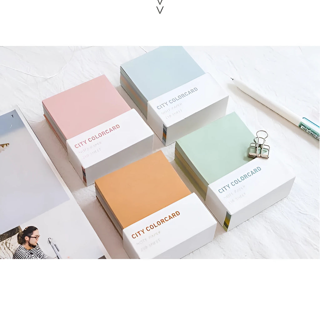 Set of rectangular 75x95mm paper memo notes with creative city colour designs in an OPP bag.